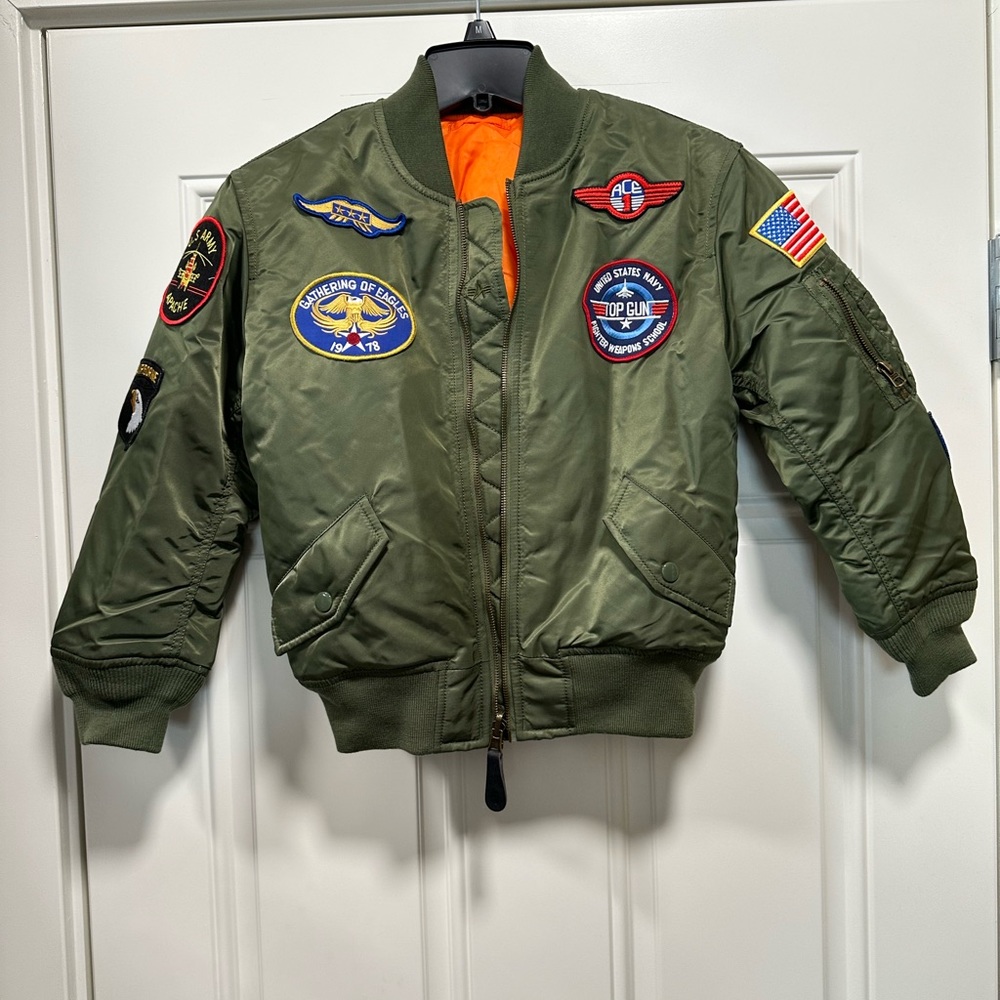 Women’s XS bomber jacket with pockets on inside and outside